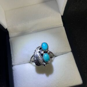 Elegant Silver and Blue Ring with Turquoise Gem